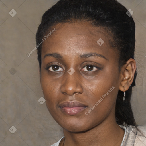 Neutral black young-adult female with short  brown hair and brown eyes