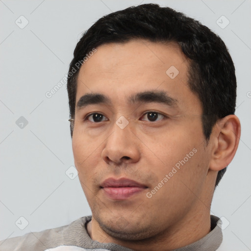 Neutral asian young-adult male with short  black hair and brown eyes