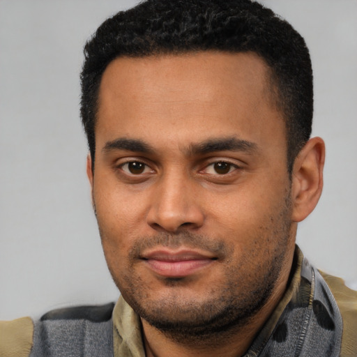 Neutral latino young-adult male with short  black hair and brown eyes