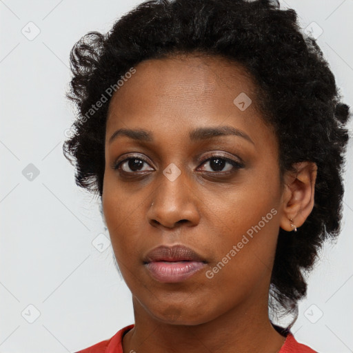 Neutral black young-adult female with short  black hair and brown eyes