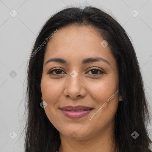 Joyful latino young-adult female with long  brown hair and brown eyes