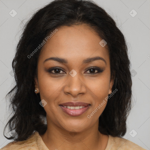 Joyful black young-adult female with long  brown hair and brown eyes