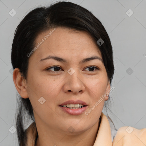 Joyful asian adult female with medium  brown hair and brown eyes