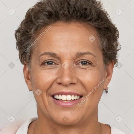 Joyful white adult female with short  brown hair and brown eyes