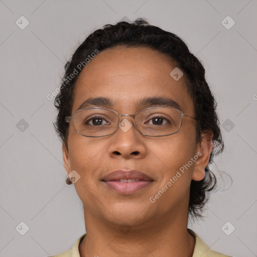 Joyful latino young-adult female with short  black hair and brown eyes