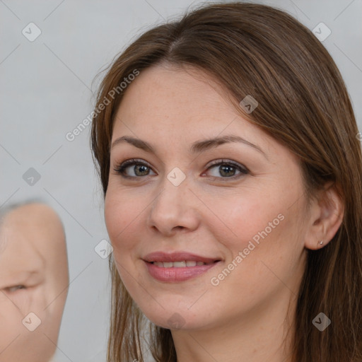 Joyful white young-adult female with long  brown hair and brown eyes