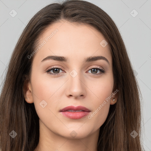 Neutral white young-adult female with long  brown hair and brown eyes