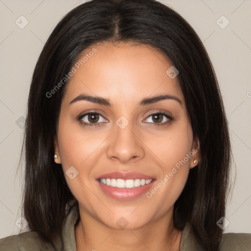 Joyful white young-adult female with long  brown hair and brown eyes