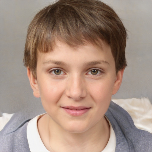 Joyful white child male with short  brown hair and brown eyes