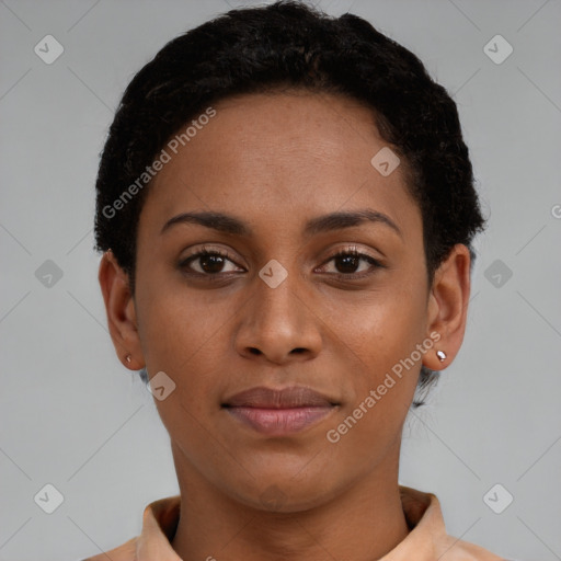 Joyful black young-adult female with short  brown hair and brown eyes