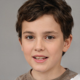 Joyful white child female with short  brown hair and brown eyes
