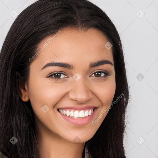 Joyful white young-adult female with long  brown hair and brown eyes