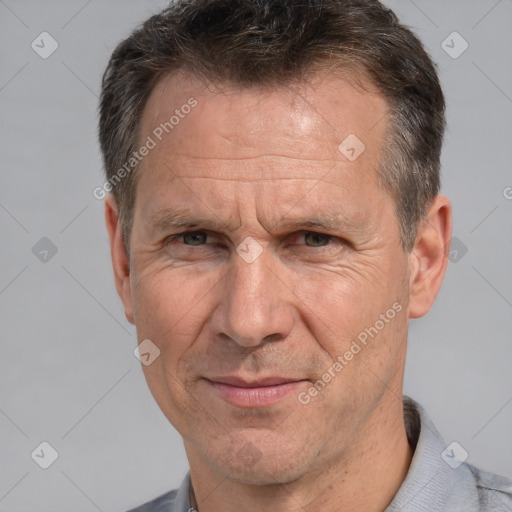 Joyful white middle-aged male with short  brown hair and brown eyes