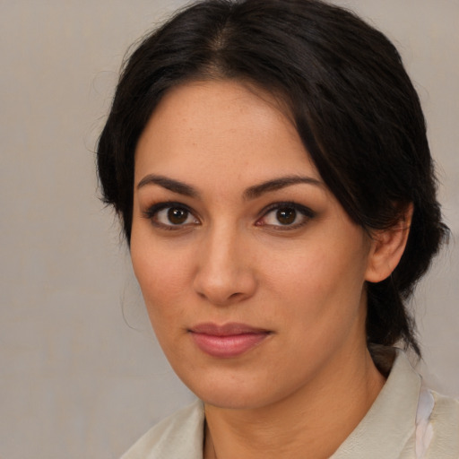 Neutral latino young-adult female with medium  brown hair and brown eyes