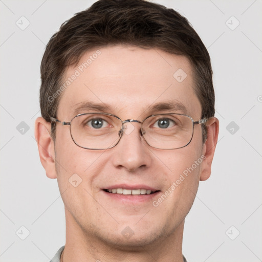 Joyful white adult male with short  brown hair and grey eyes