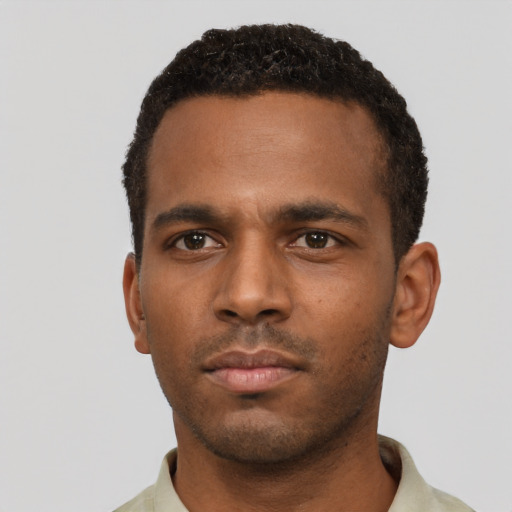 Neutral black young-adult male with short  black hair and brown eyes