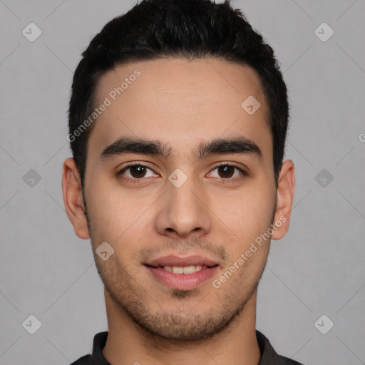 Joyful white young-adult male with short  black hair and brown eyes