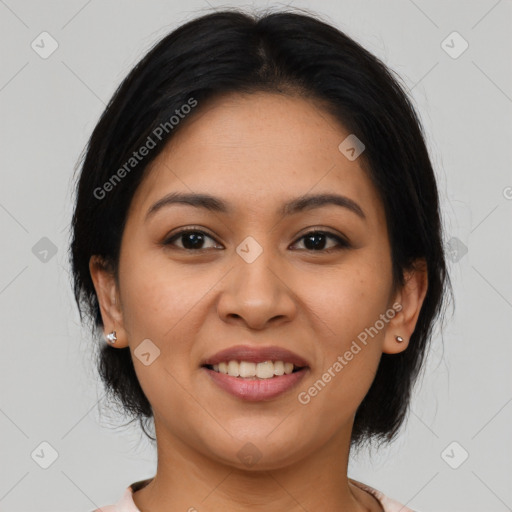 Joyful latino young-adult female with medium  brown hair and brown eyes