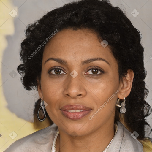 Joyful black adult female with medium  brown hair and brown eyes