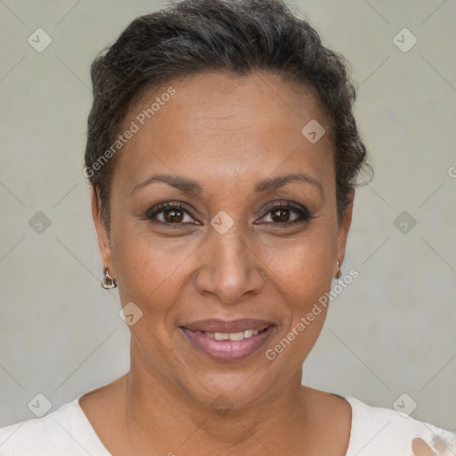 Joyful black adult female with short  brown hair and brown eyes