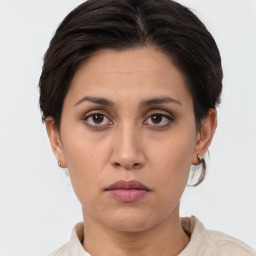 Neutral white young-adult female with short  brown hair and brown eyes