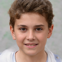 Joyful white child male with short  brown hair and brown eyes