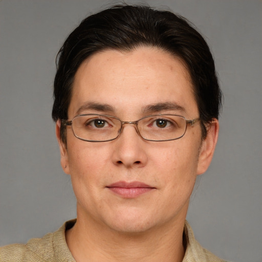 Joyful white adult male with short  brown hair and grey eyes