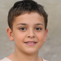 Joyful white child male with short  brown hair and brown eyes