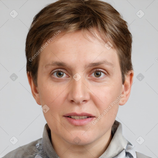 Joyful white adult male with short  brown hair and grey eyes