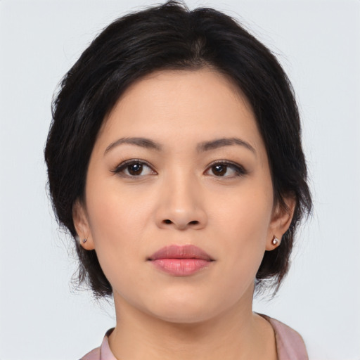 Neutral asian young-adult female with medium  brown hair and brown eyes