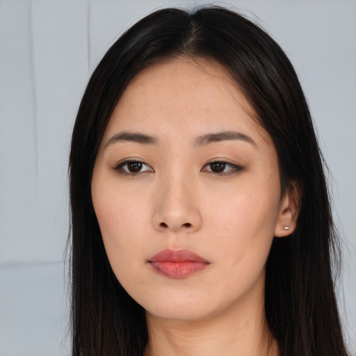 Neutral asian young-adult female with long  brown hair and brown eyes