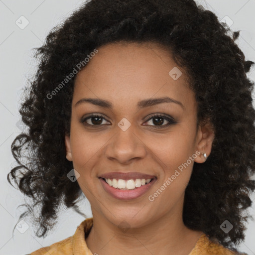 Joyful black young-adult female with medium  brown hair and brown eyes