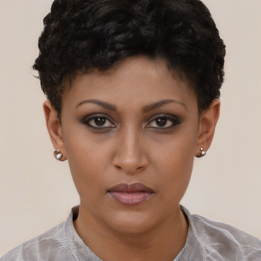 Neutral black young-adult female with short  brown hair and brown eyes