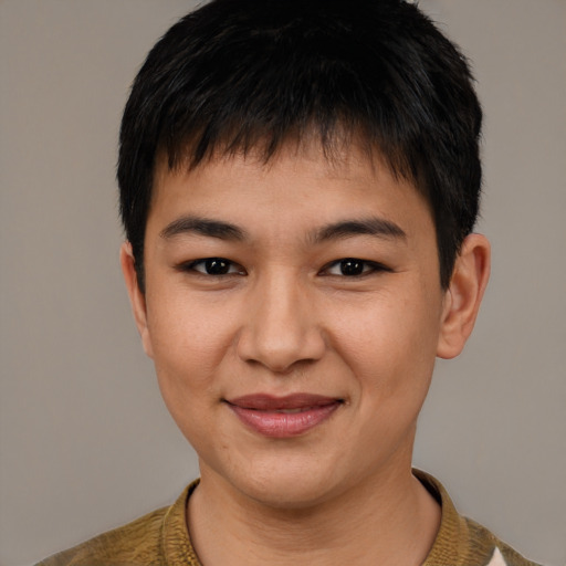 Joyful latino young-adult male with short  brown hair and brown eyes