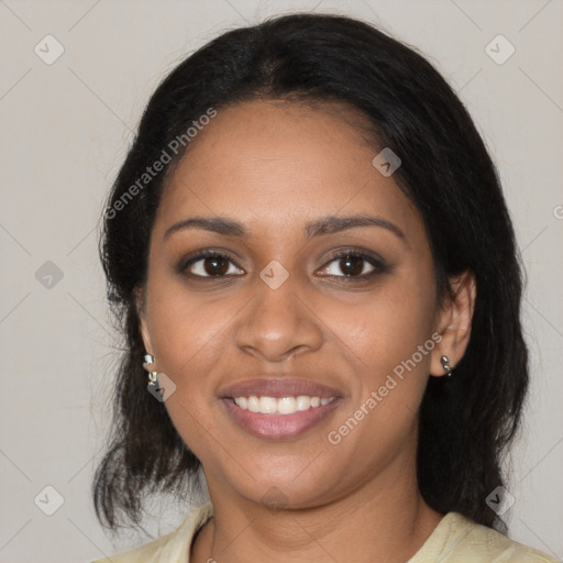 Joyful black young-adult female with medium  black hair and brown eyes