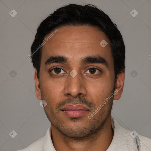 Neutral latino young-adult male with short  black hair and brown eyes