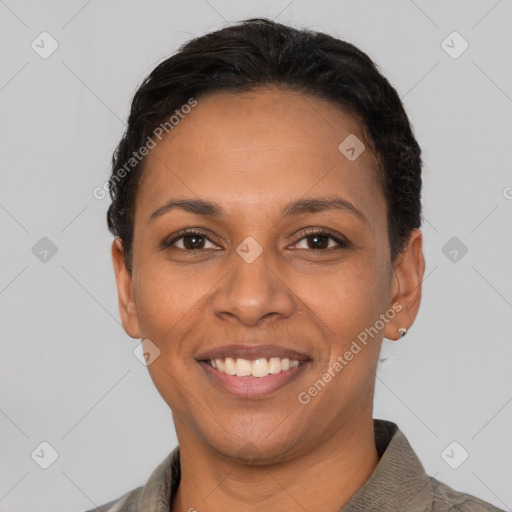 Joyful latino young-adult female with short  brown hair and brown eyes