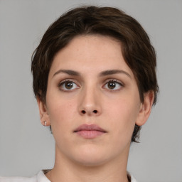 Neutral white young-adult female with short  brown hair and brown eyes