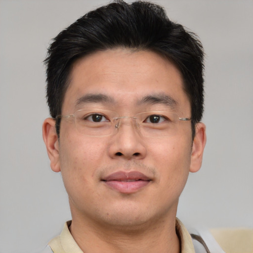 Neutral asian young-adult male with short  brown hair and brown eyes