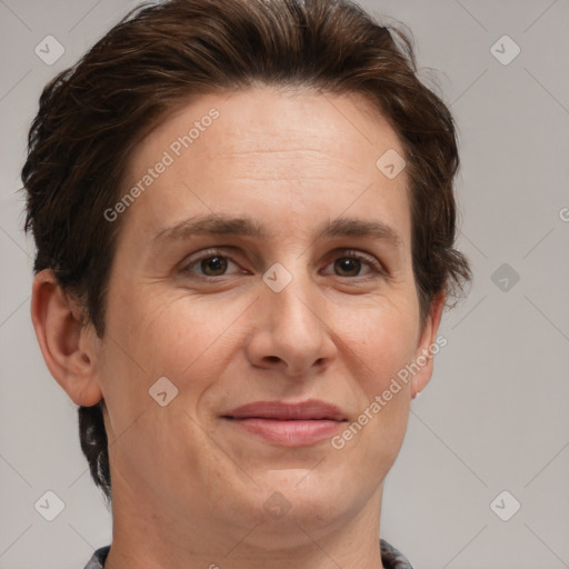 Joyful white adult female with short  brown hair and brown eyes