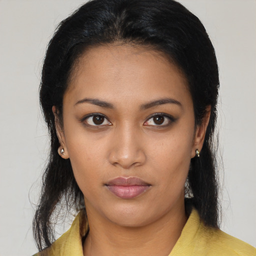 Neutral latino young-adult female with long  black hair and brown eyes