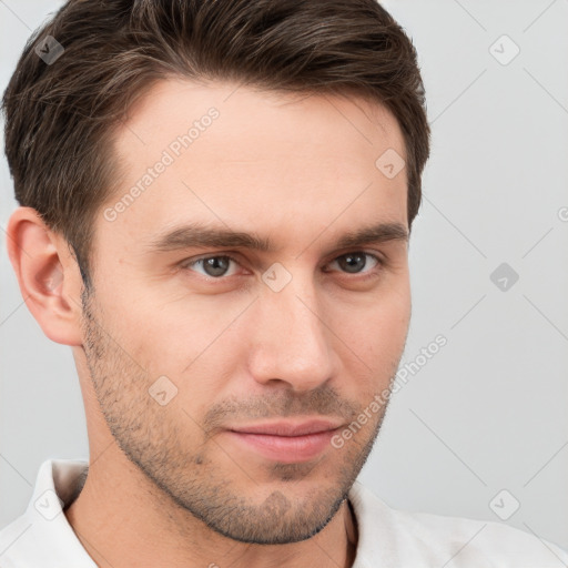 Neutral white young-adult male with short  brown hair and brown eyes