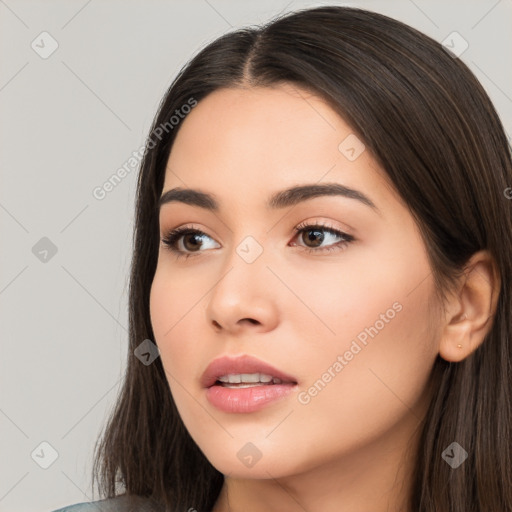 Neutral white young-adult female with long  brown hair and brown eyes