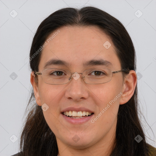 Joyful white adult female with long  brown hair and brown eyes