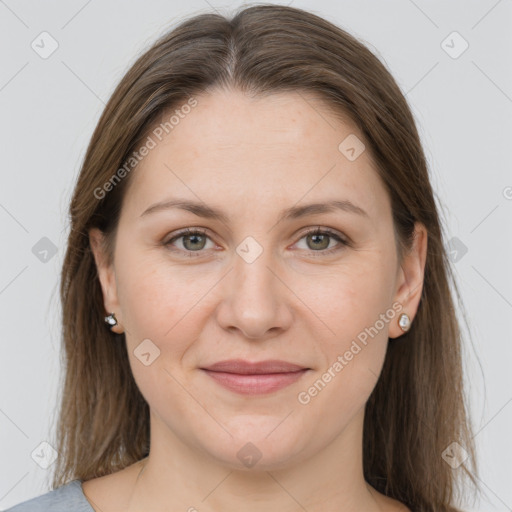 Joyful white young-adult female with long  brown hair and grey eyes