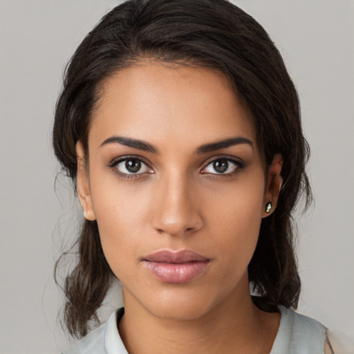 Neutral white young-adult female with medium  brown hair and brown eyes