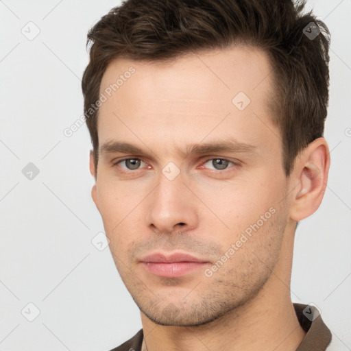 Neutral white young-adult male with short  brown hair and brown eyes