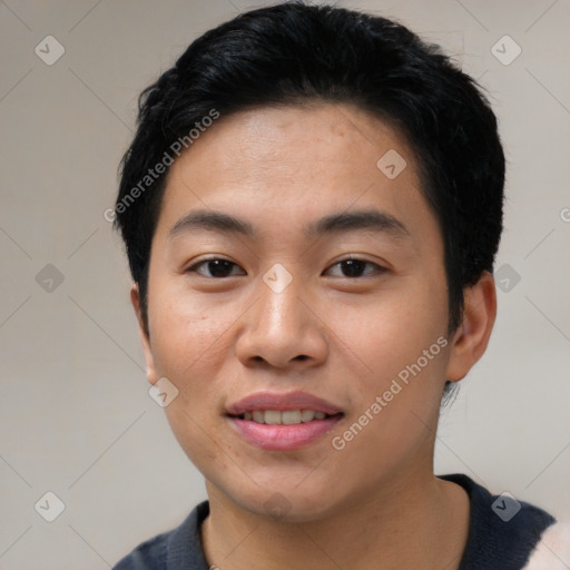 Joyful asian young-adult male with short  black hair and brown eyes