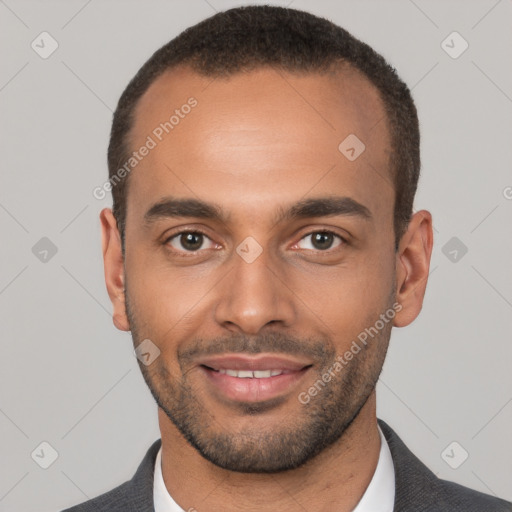 Joyful white young-adult male with short  black hair and brown eyes