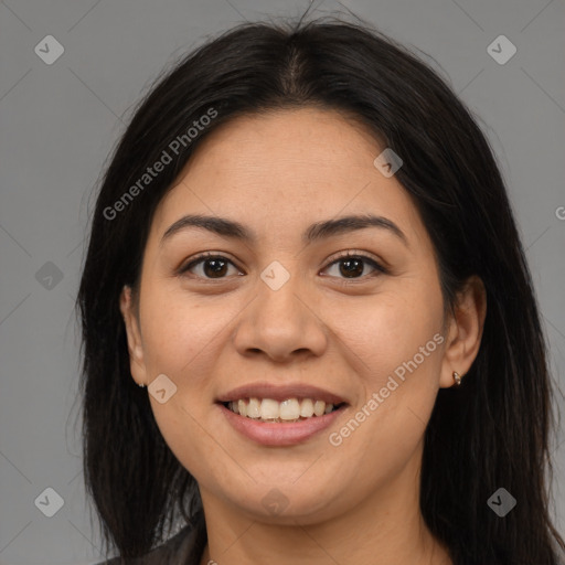 Joyful latino young-adult female with long  brown hair and brown eyes